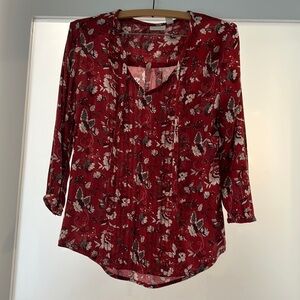 Red floral blouse